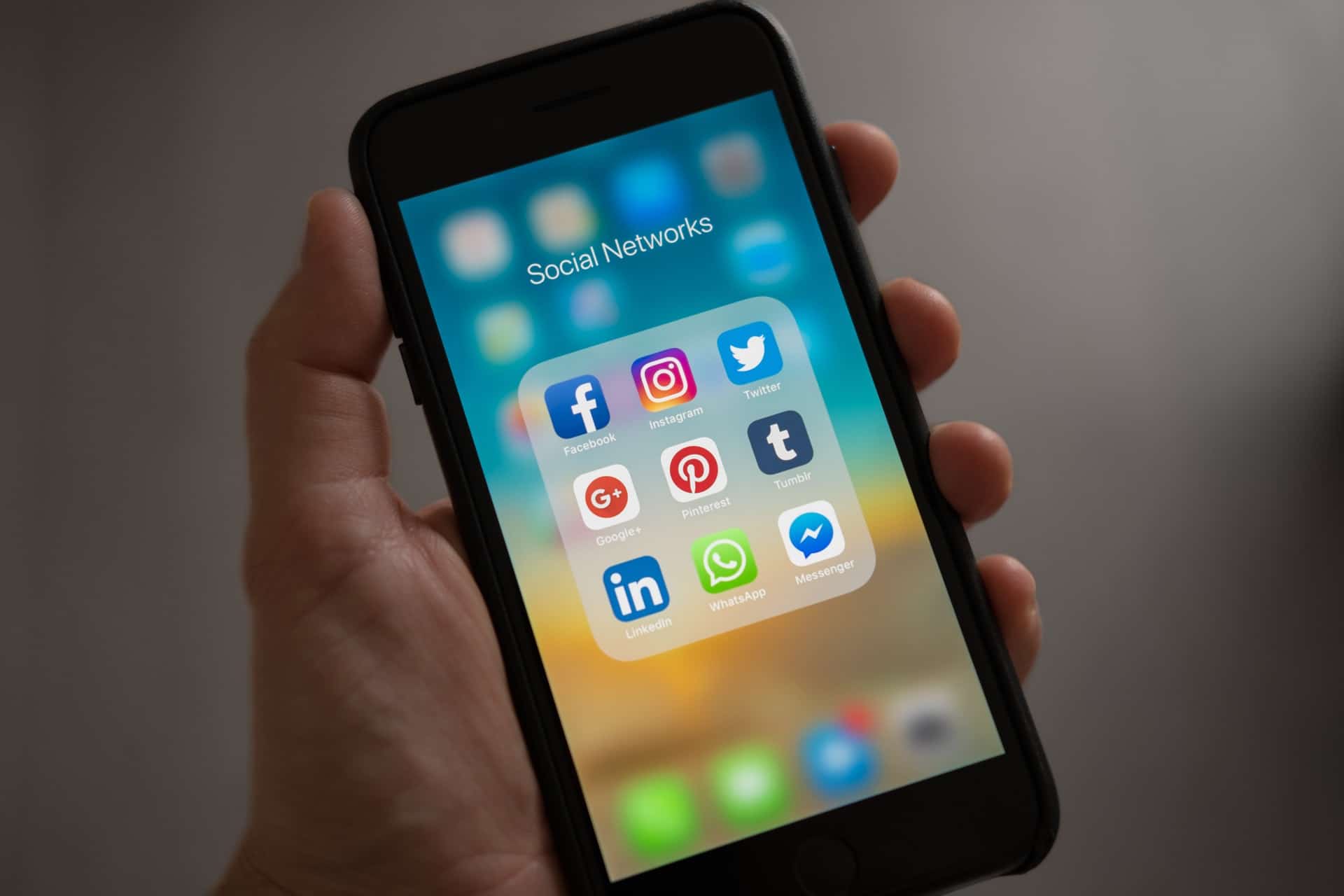 iPhone depicting social media marketing apps.